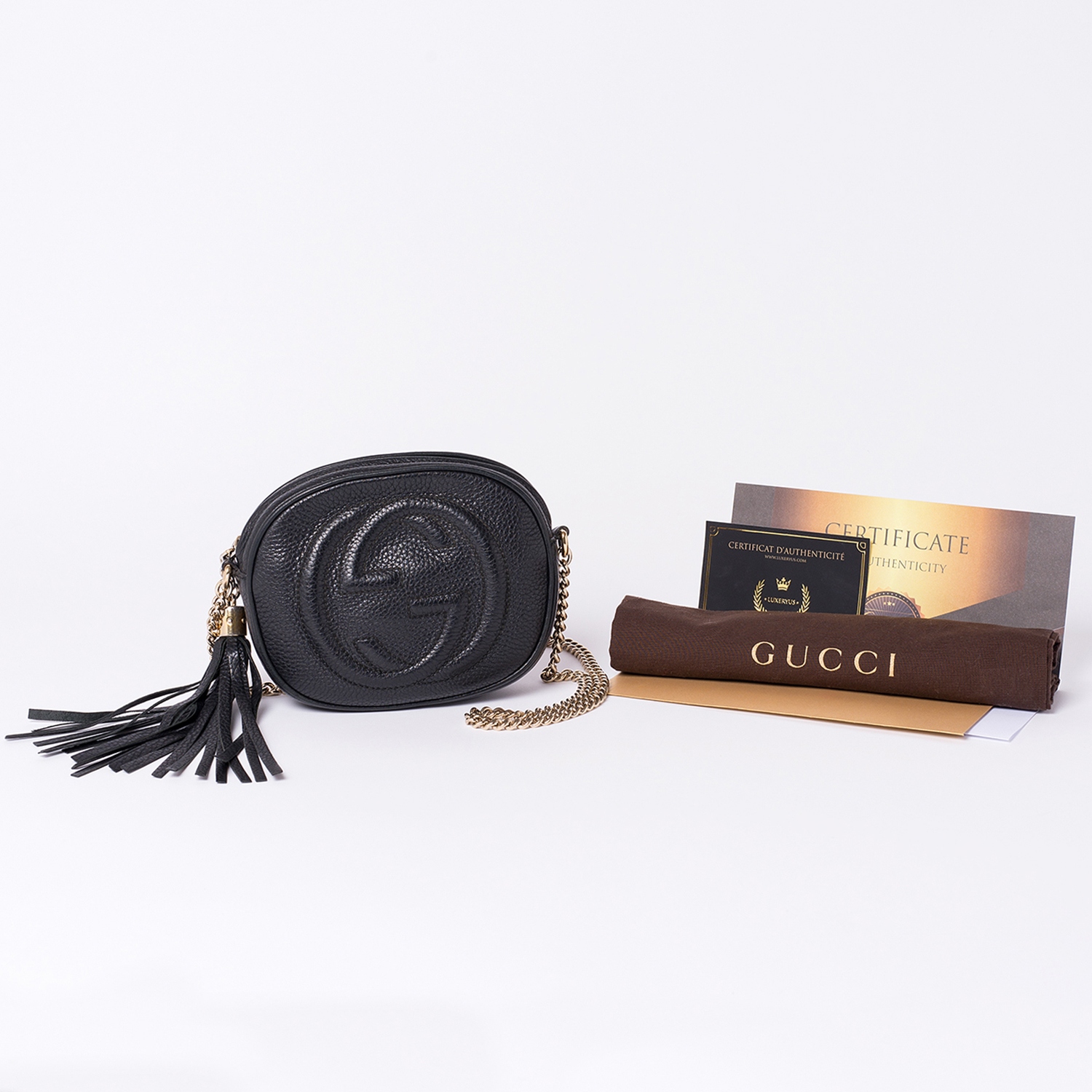 Mini Sac Gucci Soho Authentique d'occasion en cuir poudre couleur noir avec chaîne en métal doré