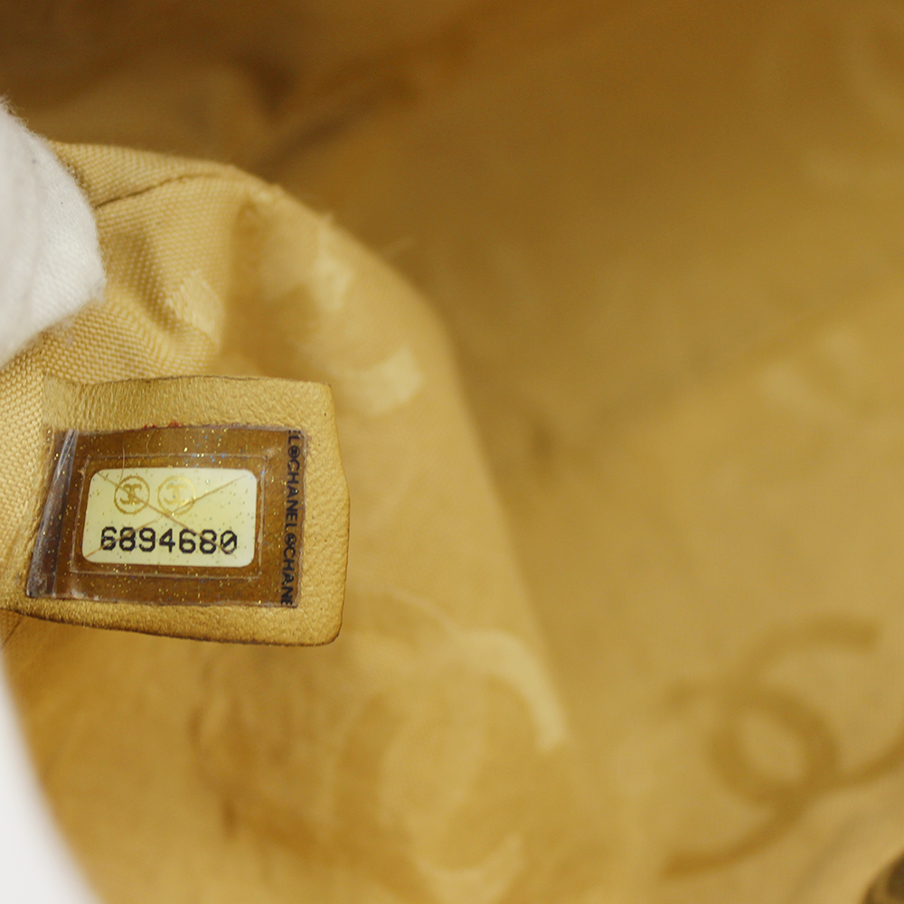 Sac à main Chanel Timeless Classique Vintage Authentique d'occasion en cuir matelassé beige et surpiqures noires