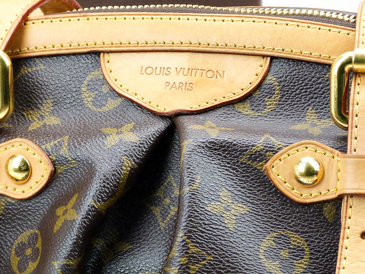 Sac à main Louis Vuitton Tivoli GM Authentique d'occasion ajustable en toile Monogram